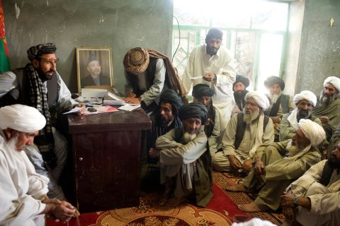 Village elders meet in Marja, Afghanistan, in March 2010.