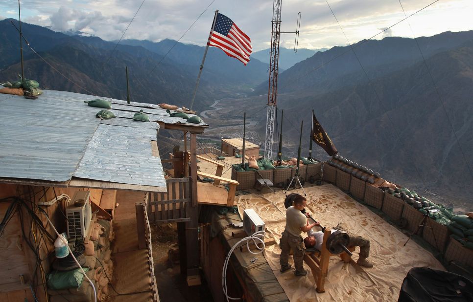 US soldiers work out at a post in Afghanistan's Kunar province in September 2011.