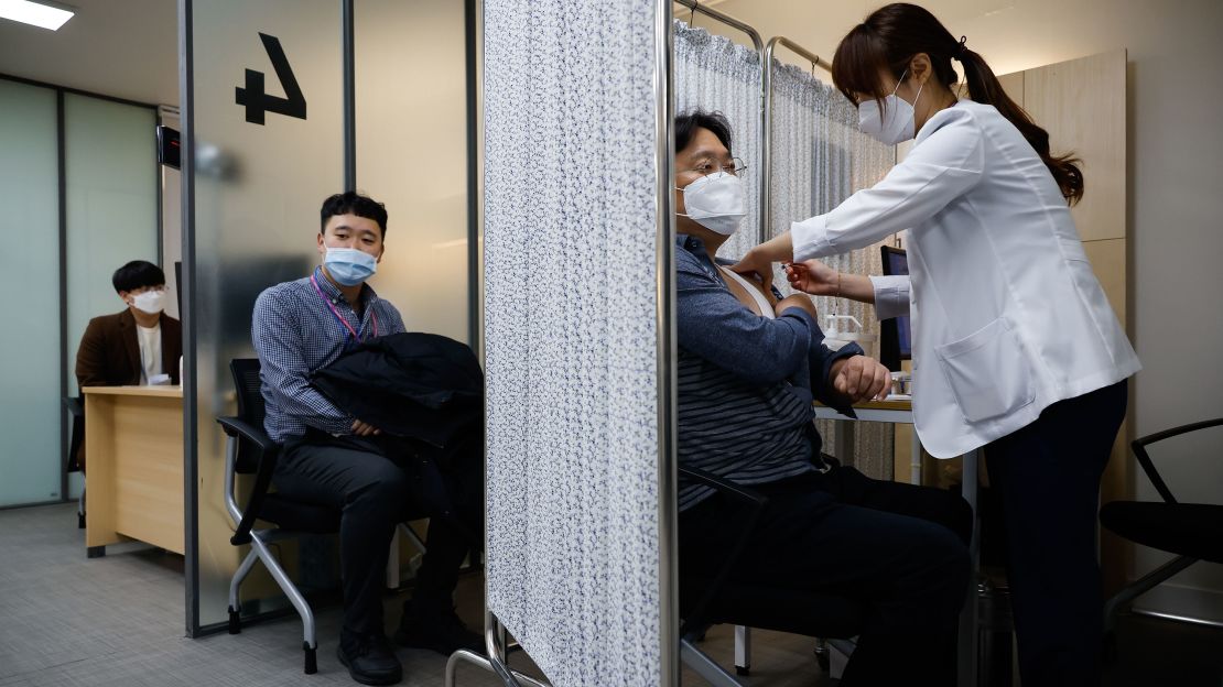 Participants take part in a mock Covid-19 vaccination drill in Seoul, South Korea.