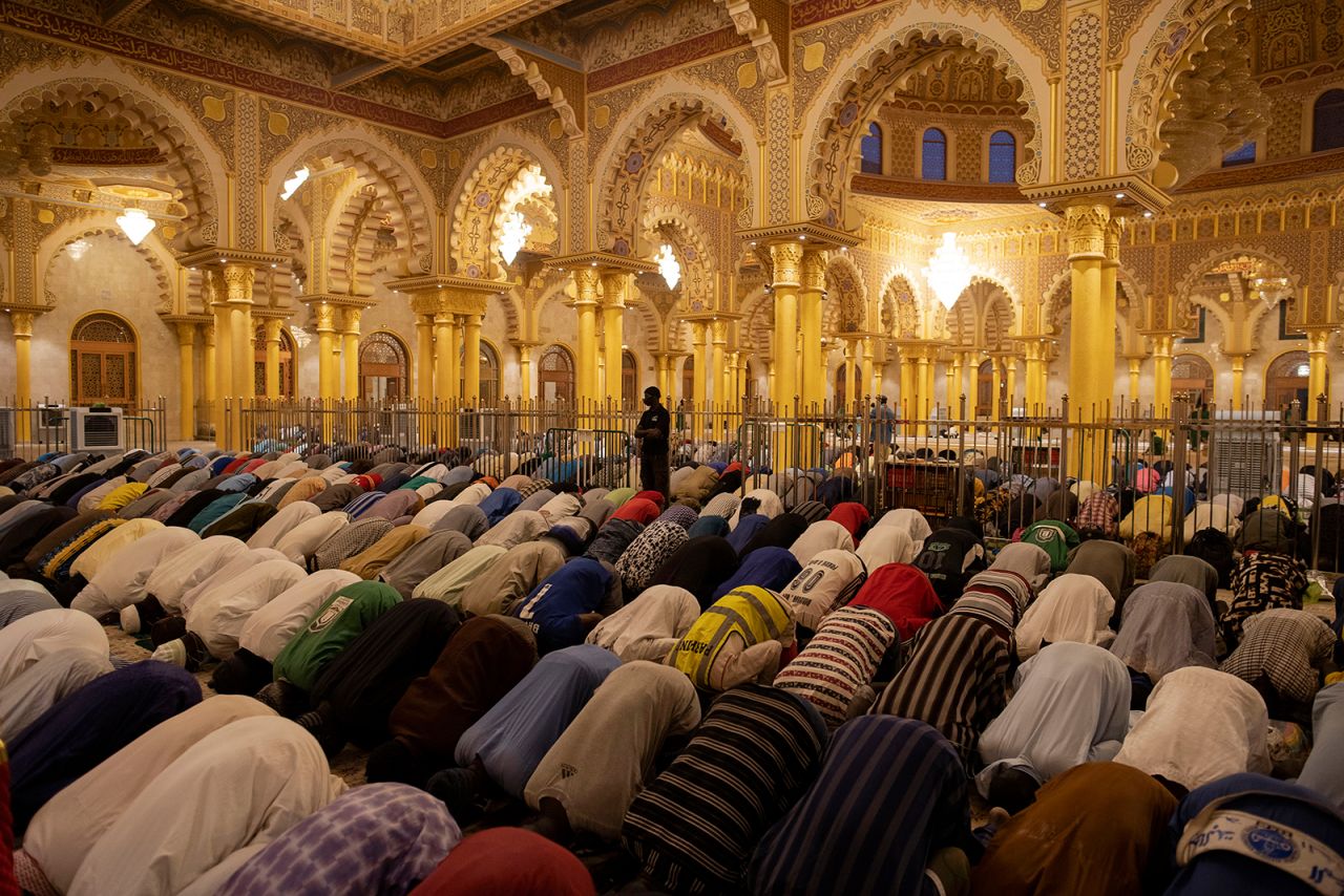 Muslims pray after breaking their fast at the Massalikul Jinaan mosque in Dakar, Senegal. 