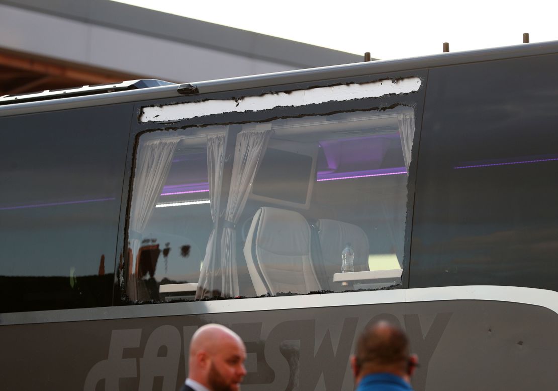 A view of the Real Madrid team bus showing damage to a window before the Champions League match at Anfield.