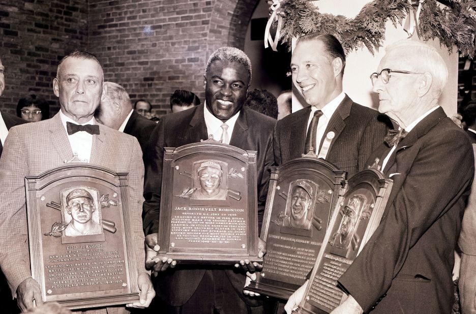 From left, Edd Roush, Robinson, Bob Feller and Bill McKechnie stand with their plaques after being inducted to the Hall of Fame in 1962.