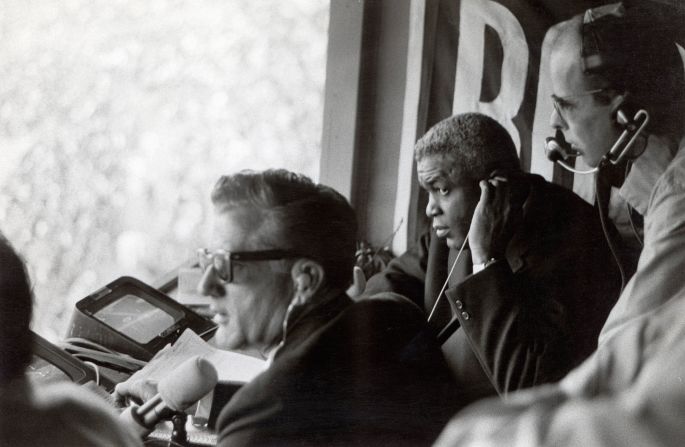 Robinson works in the broadcast booth during the 1960s.