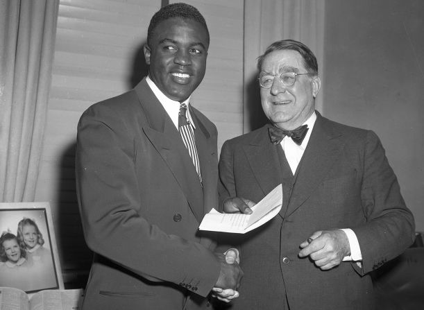 Dodgers executive Branch Rickey was integral in bringing Robinson to the majors. Rickey had been scouting players who could break the color barrier, and he was looking for someone who would be able to endure the racial hatred and not lash out in anger. "Are you looking for a Negro who is afraid to fight back?" Robinson reportedly said. Rickey responded that he was looking for someone who had <a href="index.php?page=&url=https%3A%2F%2Fbleacherreport.com%2Farticles%2F378888-guts-enough-not-to-fight-back-the-enduring-legacy-of-jackie-robinson" target="_blank" target="_blank">"the guts not to fight back."</a>