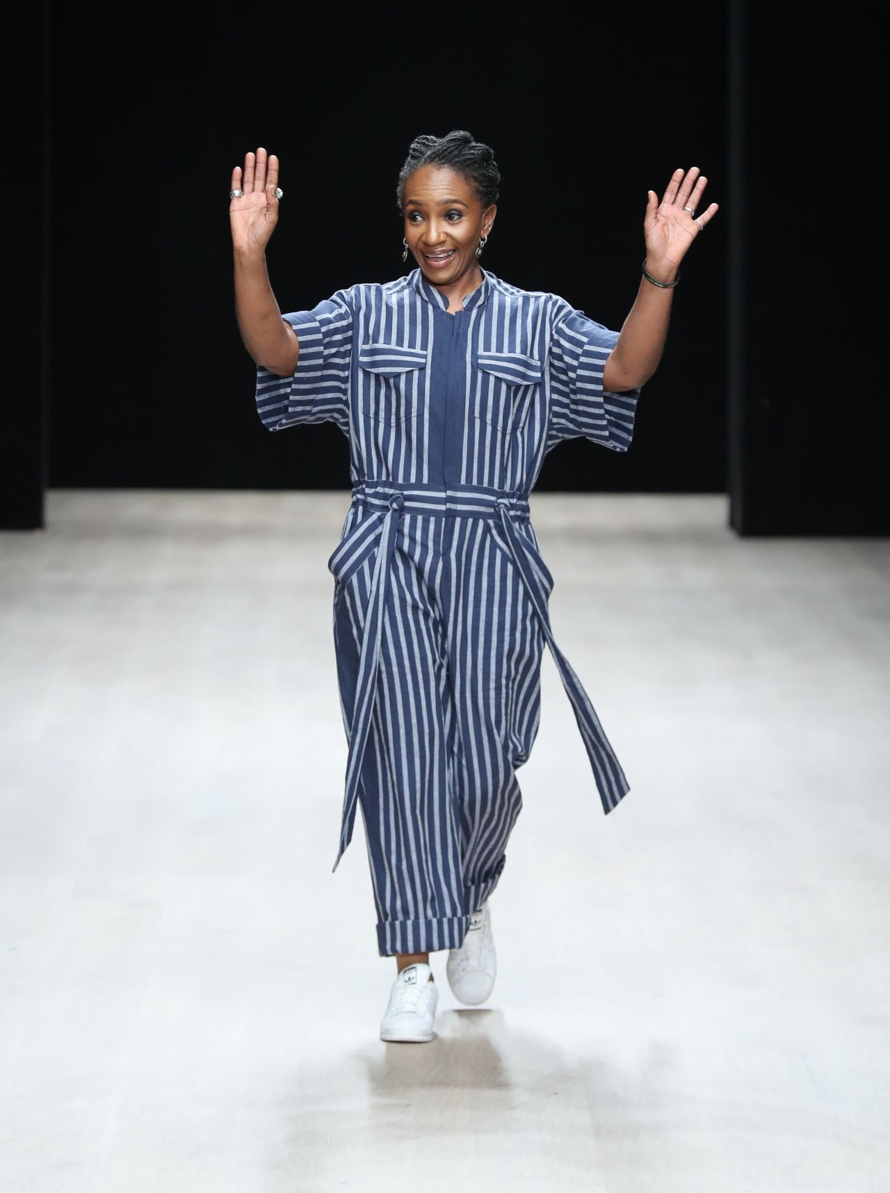 Designer Nkwo Onwuka  greets the audience during Arise Fashion Week on April 21, 2019 in Lagos, Nigeria.