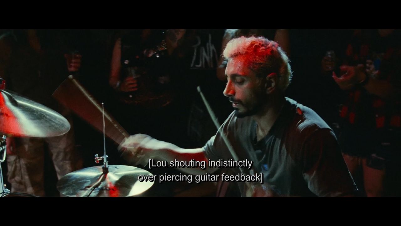 A still from the film, which employs closed captioning -- audio description beyond speech.