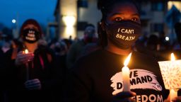 Demonstrators gather during a protest in response to the shooting death of Daunte Wright outside the Brooklyn Center Police Department, Thursday, April 15, 2021, in Brooklyn Center, Minn. (AP Photo/John Minchillo)