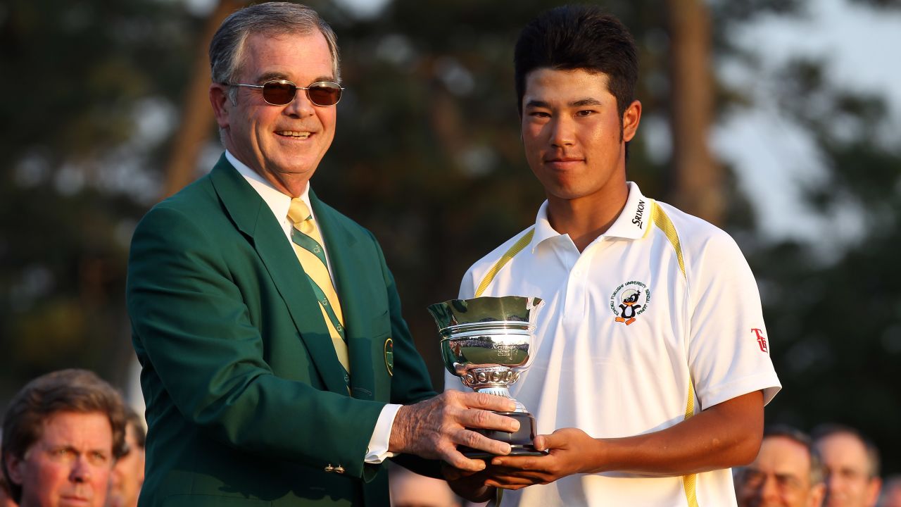 Matsuyama with the trophy for the low amateur after the final round of the 2011 Masters.