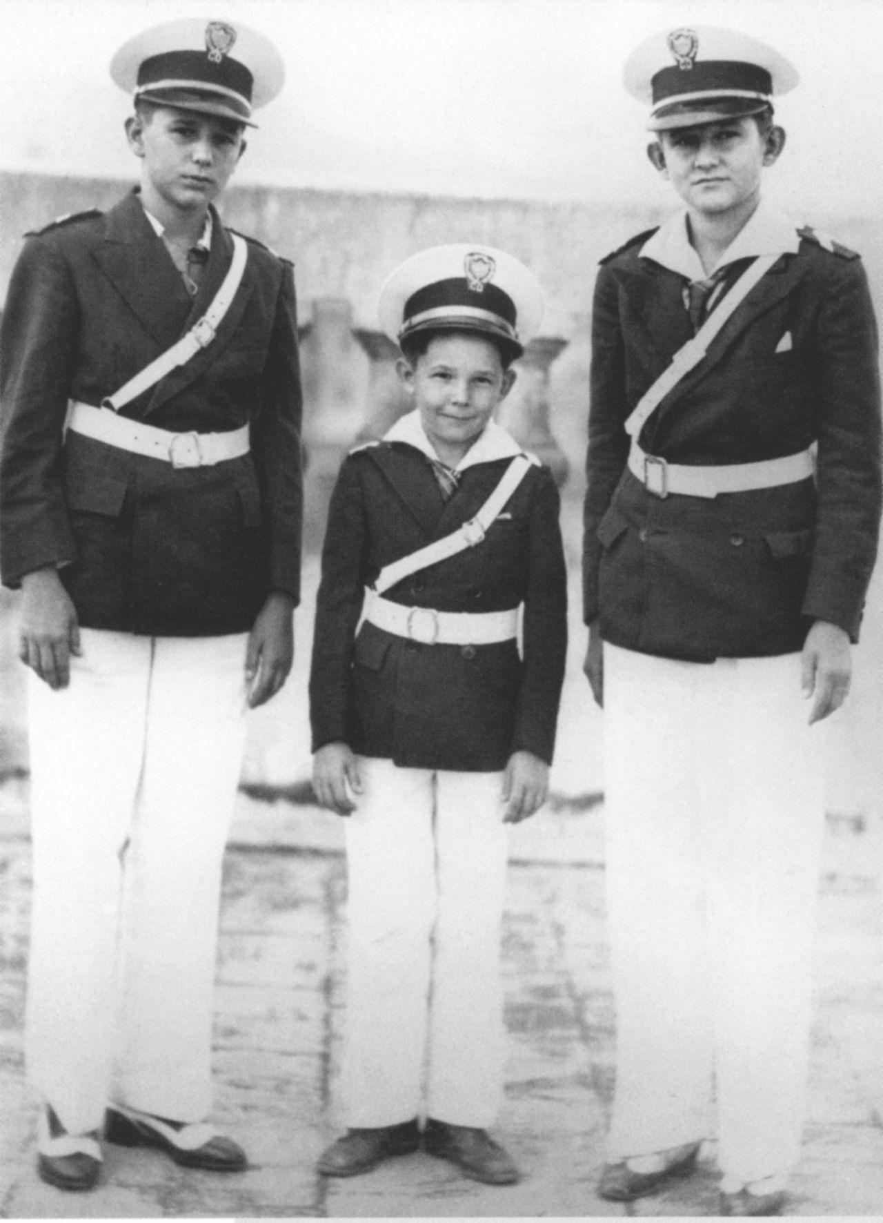 Castro, center, poses for a photo with his brothers Fidel, left, and Ramon, right, in Santiago de Cuba around 1940.