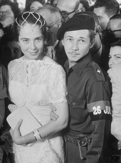 Castro poses for a photo with his wife Vilma at their wedding in 1959.
