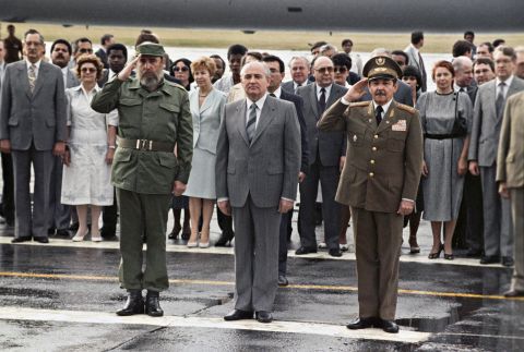 Raul and Fidel Castro stand alongside Soviet Union leader Mikhail Gorbachev as he prepares to leave Cuba after an official visit in 1989.