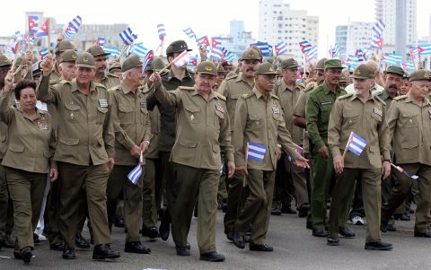 Castro takes part in a march against terrorism in front of the United States Interests Section in Havana in May 2005.