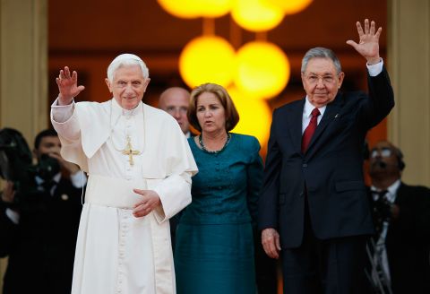 Pope Benedict XVI and Castro wave to the media after a meeting in Havana in 2012.
