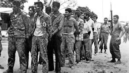This April 1961 file photo shows a group of Cuban counter-revolutionaries, members of Assault Brigade 2506, after their capture in the Bay of Pigs, Cuba. 