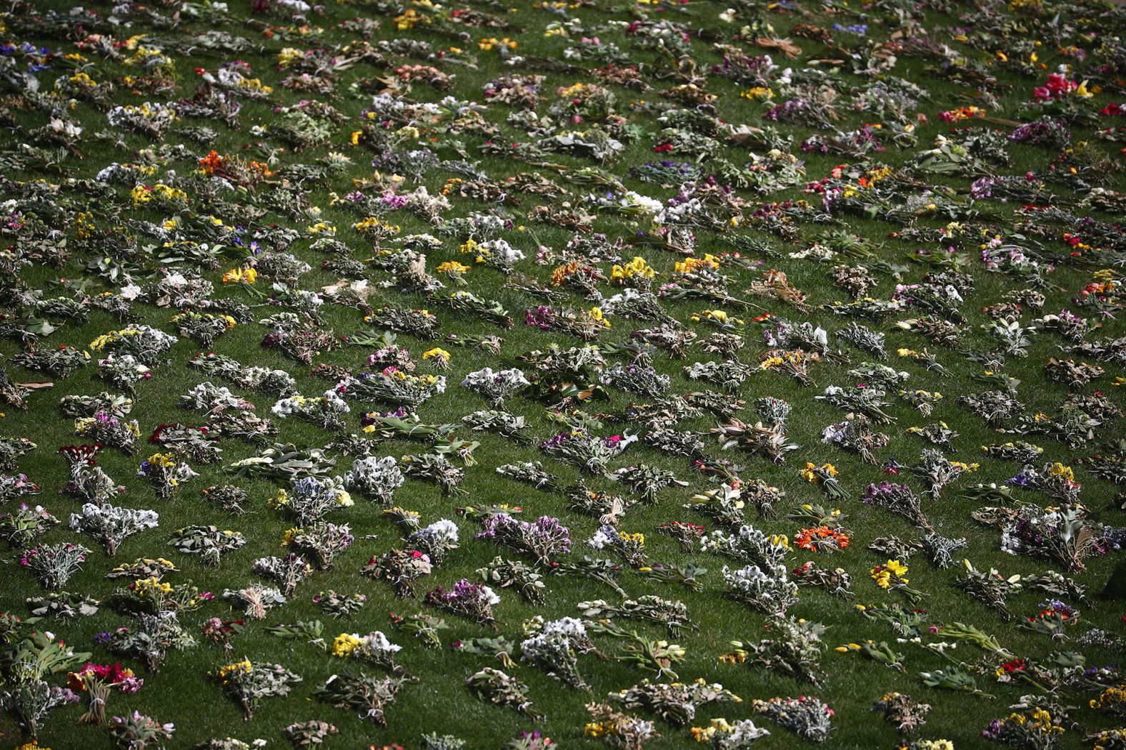 Floral tributes are laid out on the grounds of Windsor Castle.