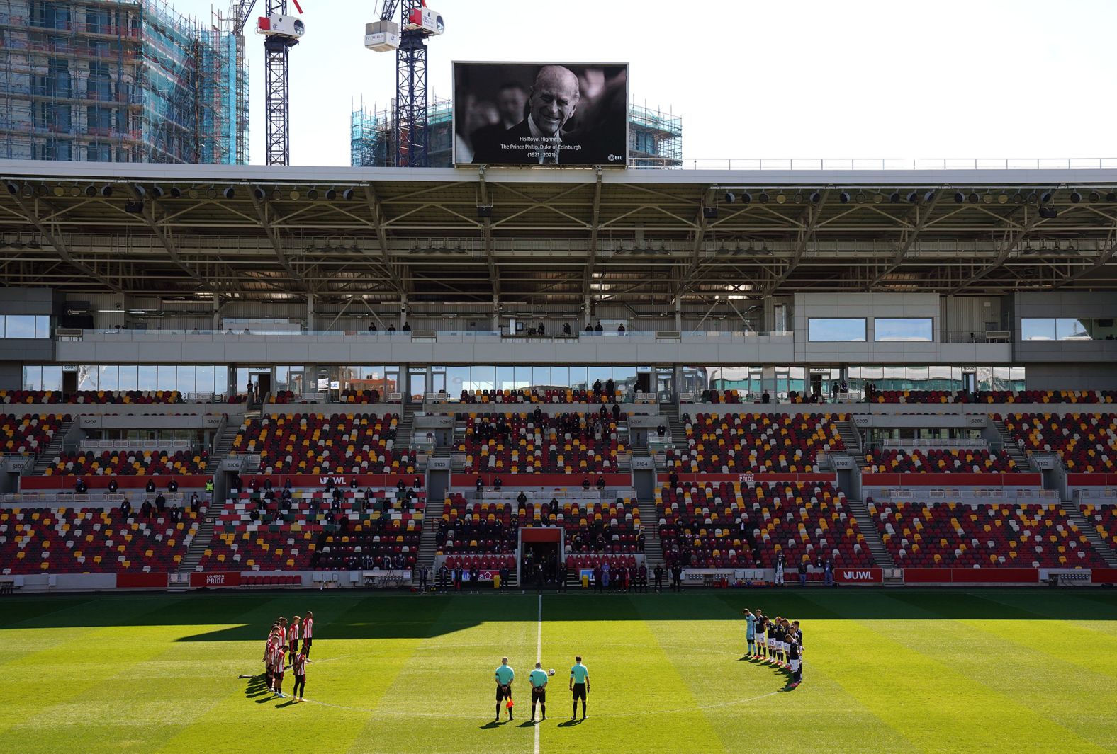 A minute of silence is observed for Philip before a professional soccer match in London between Brentford and Millwall on Saturday.