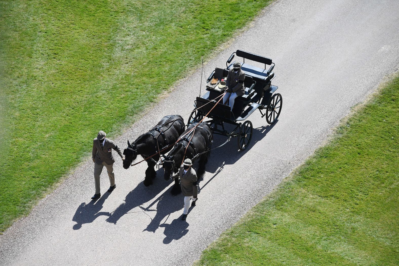 Balmoral Nevis and Notlaw Storm, the Fell ponies that belonged to Prince Philip, are led through the grounds of Windsor Castle before the funeral.