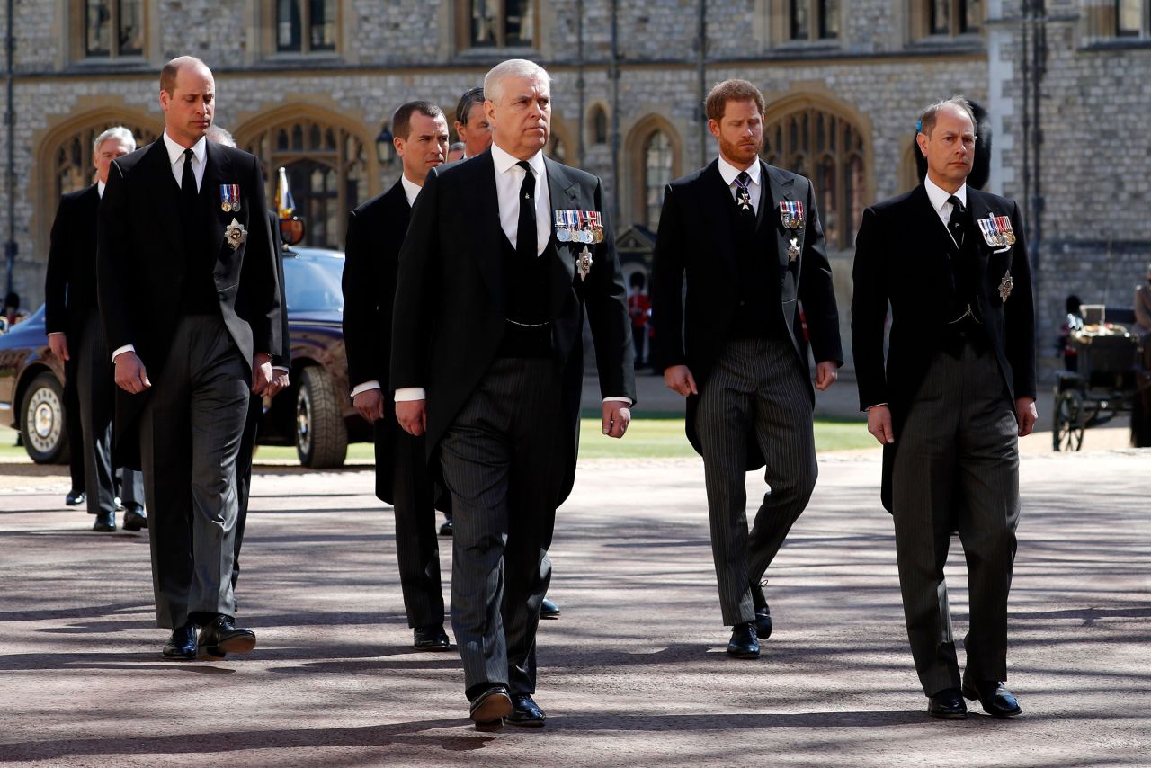 Members of the royal family walk behind Philip's coffin during the procession to St. George's Chapel. In the first row here are Philip's sons Prince Andrew, left, and Prince Edward. Behind them are Philip's grandsons Prince William, Peter Phillips and Prince Harry.