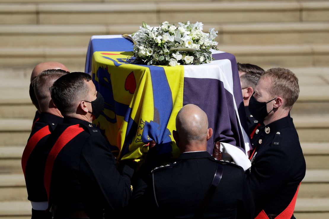 Prince Philip, Duke of Edinburgh's coffin is carried on the West Steps of St. George's Chapel at Windsor Castle.