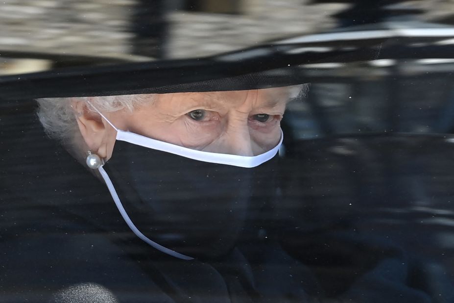 The Queen is seen in the Royal Bentley on the way to her husband's funeral.