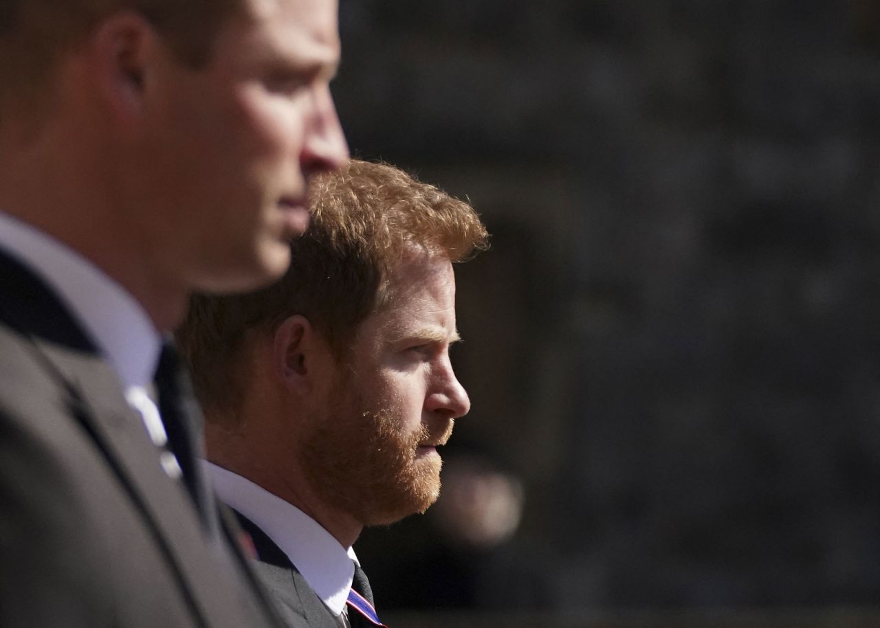 Prince William and Prince Harry take part in the funeral procession.