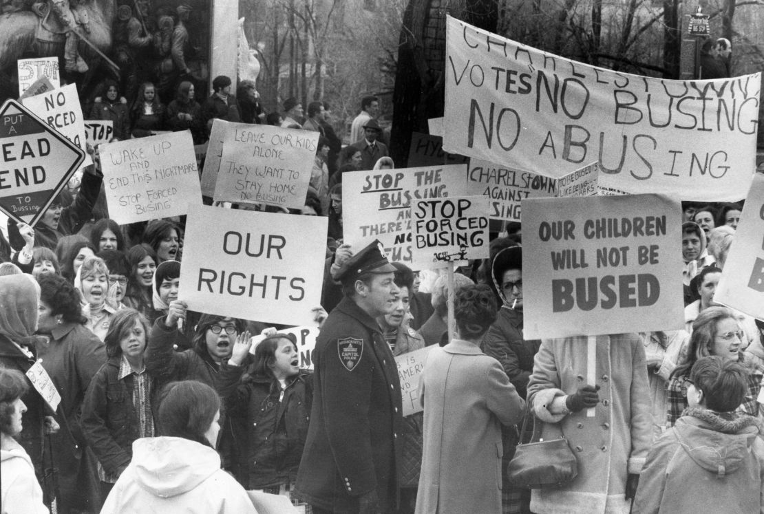 An anti-busing group holds a protest across from the Massachusetts State House in Boston on April 3, 1973.