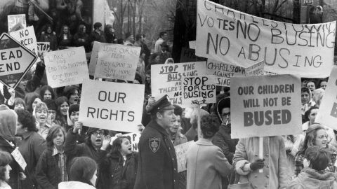An anti-busing group holds a protest across from the Massachusetts State House in Boston on April 3, 1973. 