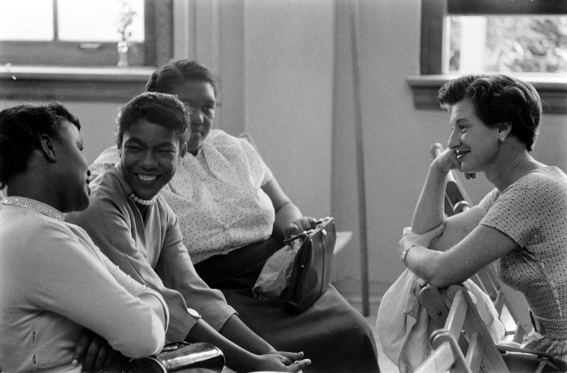 Parents of students in a newly integrated classroom talking after school in 1956 in Louisville, Kentucky.