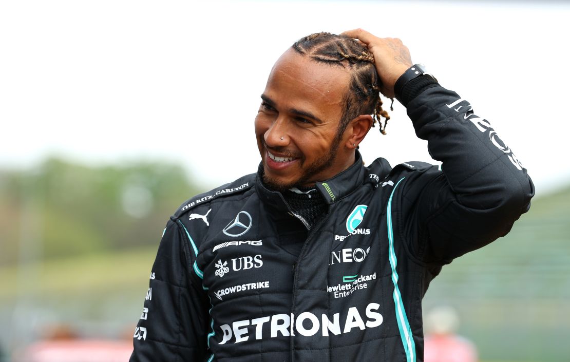 Lewis Hamilton celebrates his 99th pole position.
