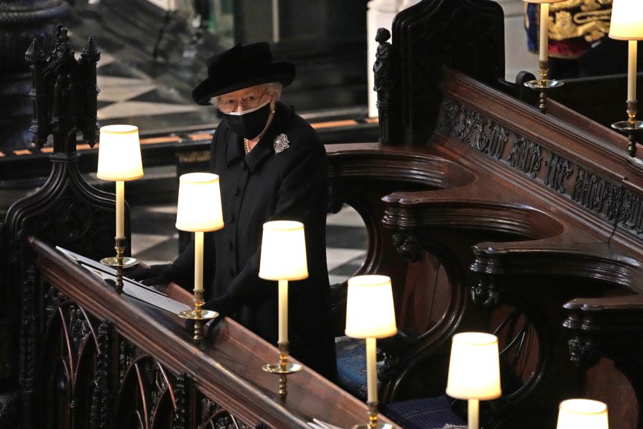 The Queen stands during the funeral. She and Prince Philip were married for 73 years.