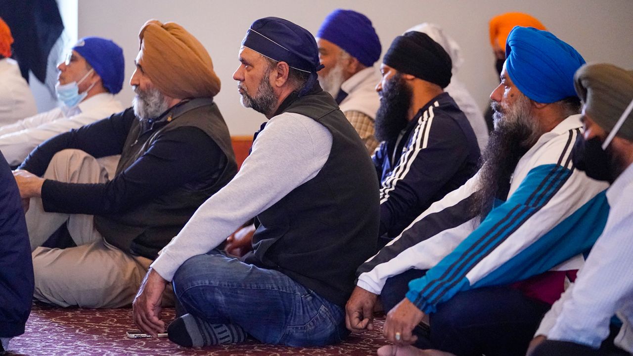 Members of the Sikh Coalition gather at the Sikh Satsang of Indianapolis on Saturday, April 17, to formulate the group's response to the shooting at a FedEx facility that claimed the lives of four members of the Sikh community.