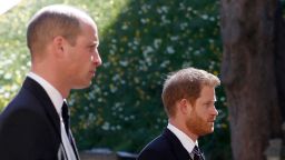 TOPSHOT - Britain's Prince William, Duke of Cambridge (L) and Britain's Prince Harry, Duke of Sussex follow the coffin during the ceremonial funeral procession of Britain's Prince Philip, Duke of Edinburgh to St George's Chapel in Windsor Castle in Windsor, west of London, on April 17, 2021. - Philip, who was married to Queen Elizabeth II for 73 years, died on April 9 aged 99 just weeks after a month-long stay in hospital for treatment to a heart condition and an infection. (Photo by Alastair Grant / various sources / AFP) (Photo by ALASTAIR GRANT/AFP via Getty Images)