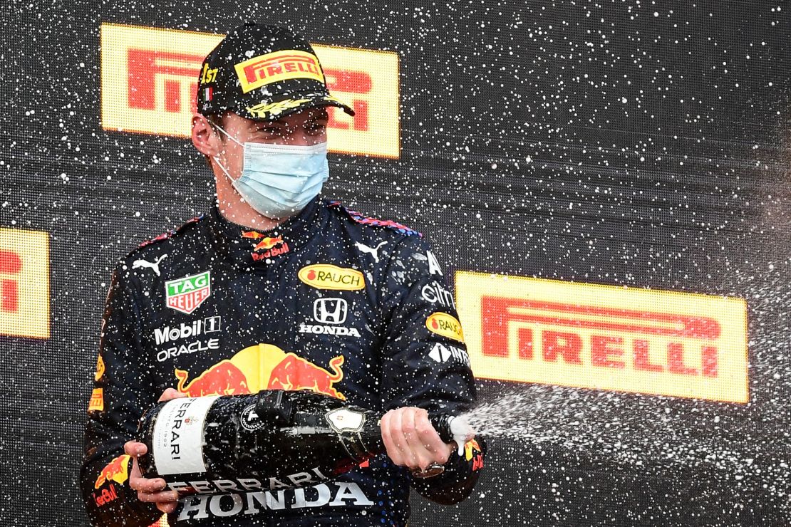 Max Verstappen celebrates after winning the Imola Grand Prix.