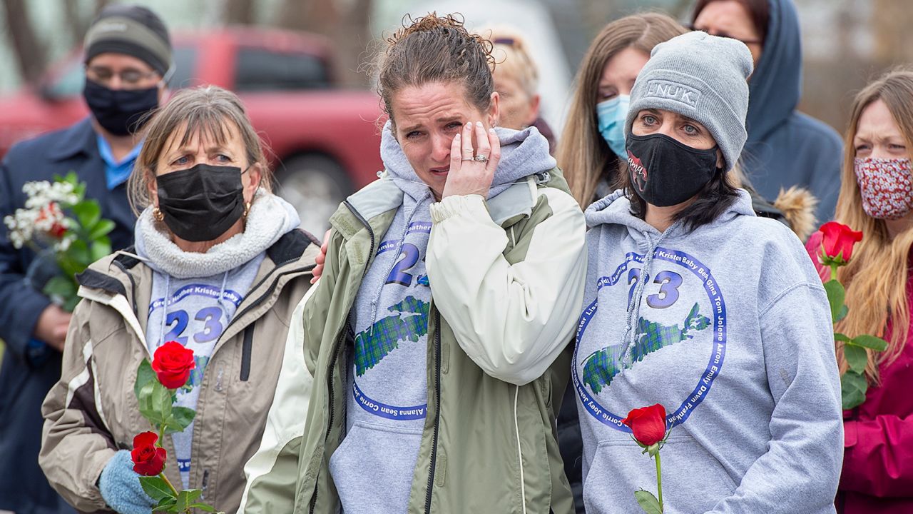 Family and friends of the 22 victims of the April 2020 mass shooting in rural Nova Scotia mark the one-year anniversary in Bible Hill, N.S., on Sunday, April 18, 2021. 