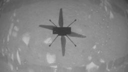 NASA's Ingenuity Mars Helicopter took this shot while hovering over the Martian surface on April 19, 2021, during the first instance of powered, controlled flight on another planet. It used its navigation camera, which autonomously tracks the ground during flight.