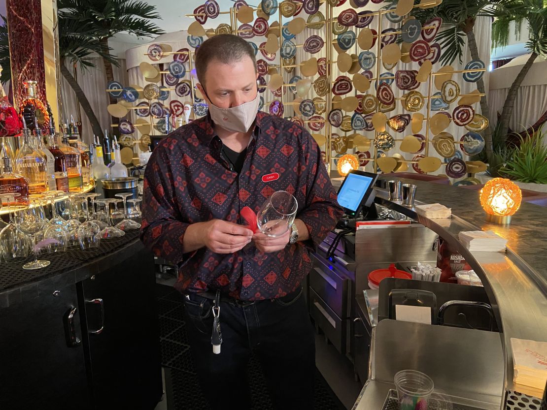 After a year out of work, bartender Cash Caterine became one of 1,300 former Hard Rock Hotel & Casino employees rehired after the property reopened as Virgin Hotels Las Vegas.