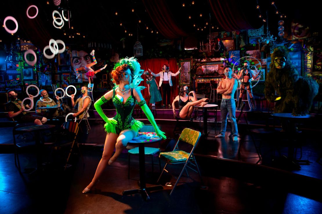 "Absinthe" is performed in a tent with guests seated at socially distanced tables.