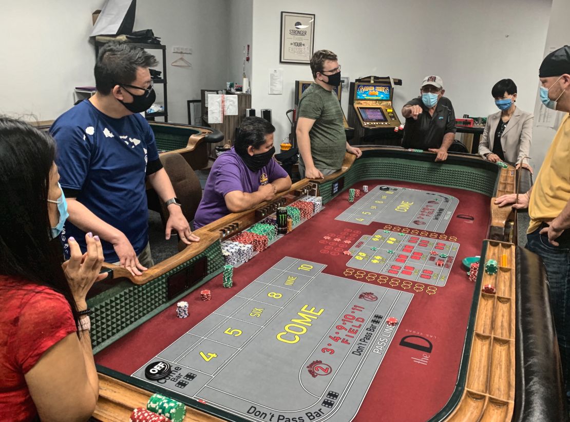 Students practice at the CEG Dealer School, where enrollment has skyrocketed after the pandemic forced many laid off workers to explore new job options in the lucrative casino business.