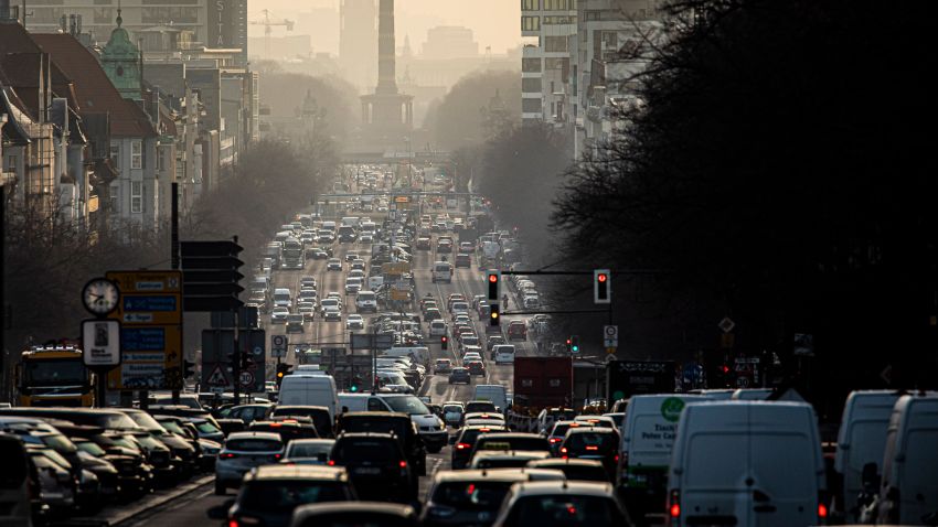 The morning rush hour on the street Bismarckstrasse is pictured during morning light on February 25, 2021 in Berlin, Germany. (Photo by Florian Gaertner/Photothek via Getty Images)