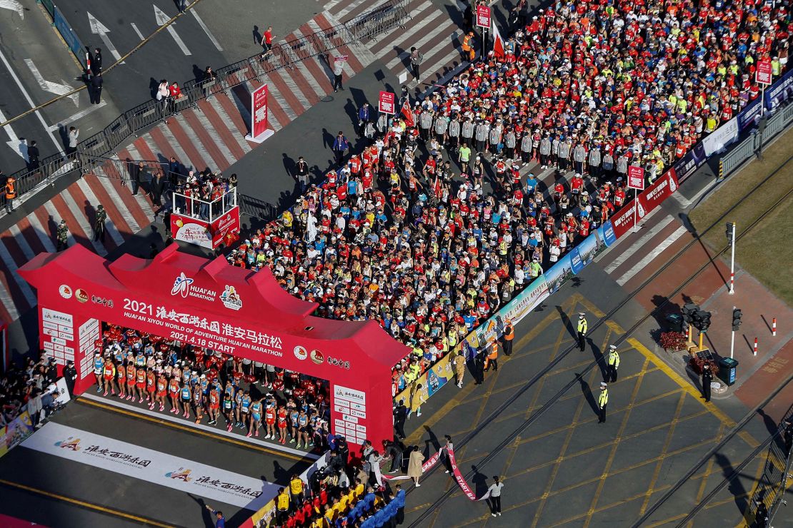 It's become almost a cliche to point out how much China has returned to normality, but this image of hundreds of mask-less people preparing to run a marathon in Huaian, Jiangsu province, on April 18 is still striking.