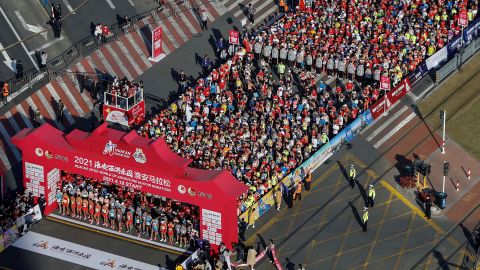 It's become almost a cliche to point out how much China has returned to normality, but this image of hundreds of mask-less people preparing to run a marathon in Huaian, Jiangsu province, on April 18 is still striking.