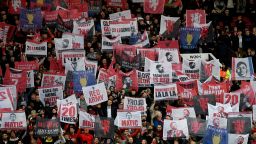 United fans hold up banners during the UEFA Champions league first leg quarter-final football match between Manchester United and Barcelona at Old Trafford in Manchester, north west England, on April 10, 2019. (Photo by LLUIS GENE / AFP)        (Photo credit should read LLUIS GENE/AFP via Getty Images)