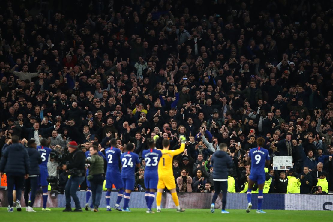 Chelsea players applaud their fans following victory during the Premier League match against Tottenham Hotspur.