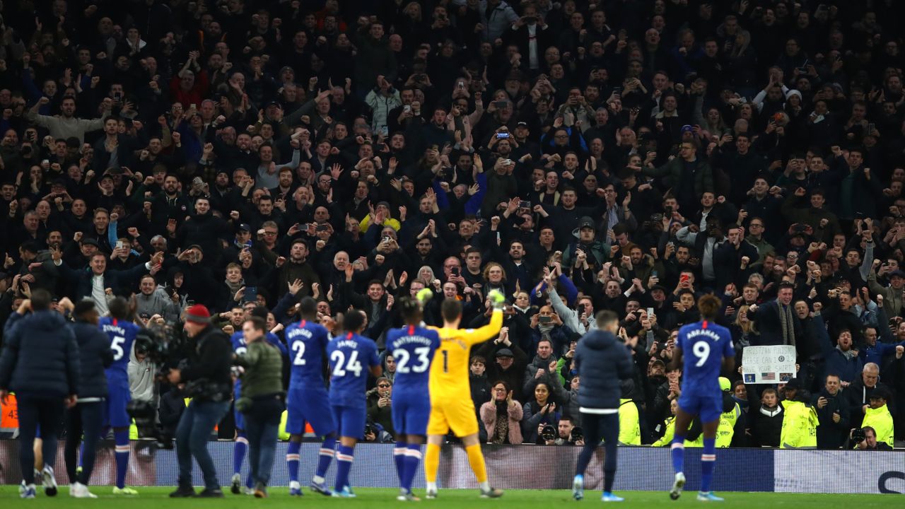 Chelsea players applaud their fans following victory during the Premier League match against Tottenham Hotspur.