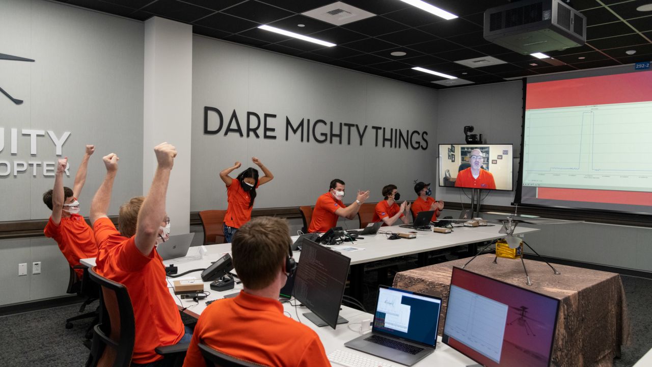 The helicopter team celebrates the sucess of Ingenuity's first flight.