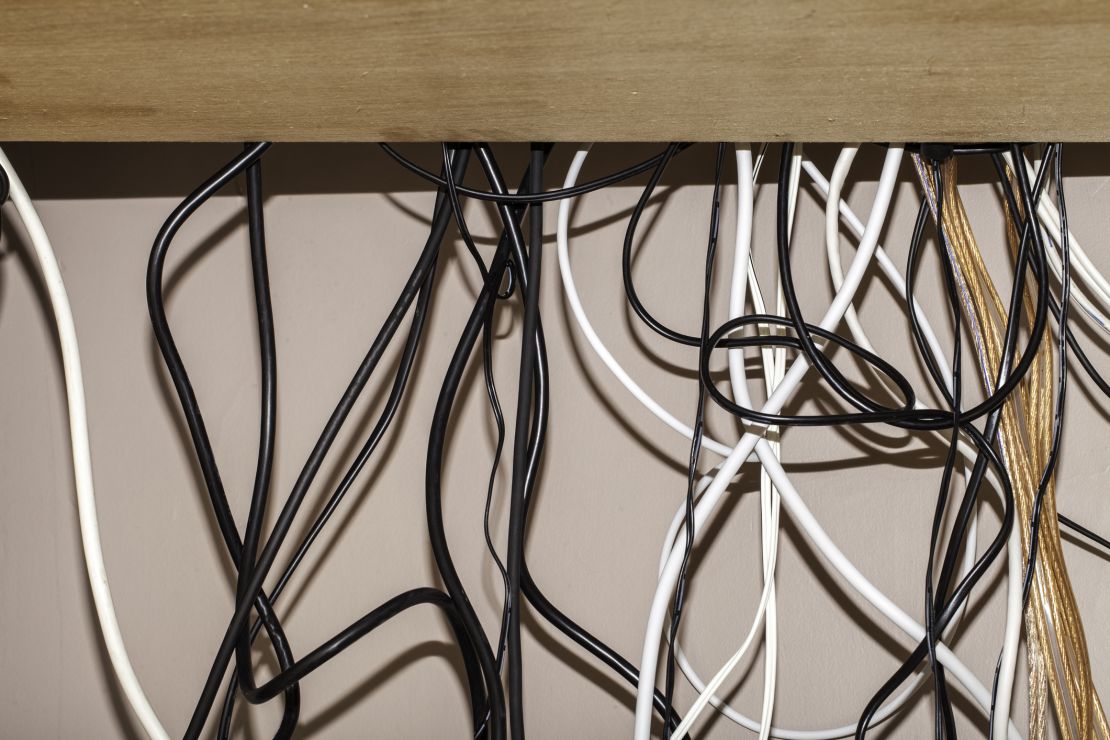 You can bundle that mess of cords together with some simple cable ties.