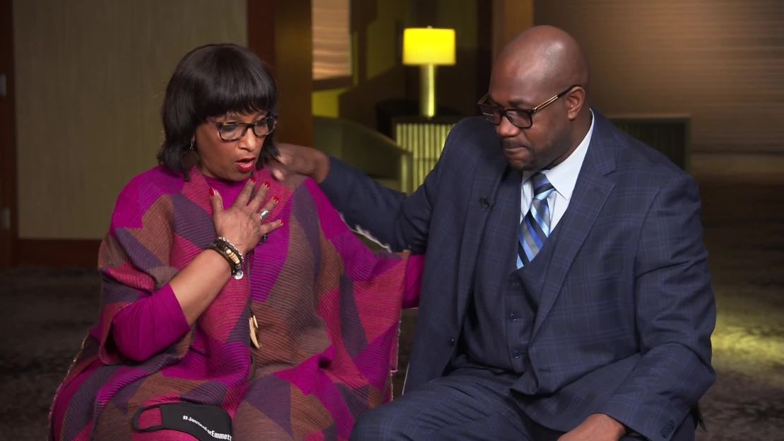 Deborah Watts and Philonise Floyd  try to comfort each other while talking about their grief.