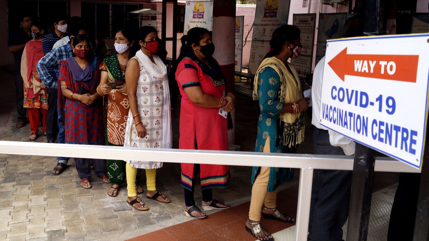 Citizens queue to receive a COVID-19 vaccine in the eastern Indian state Odisha's capital city Bhubaneswar on April 12, 2021. (Photo by Stringer/NurPhoto via Getty Images)