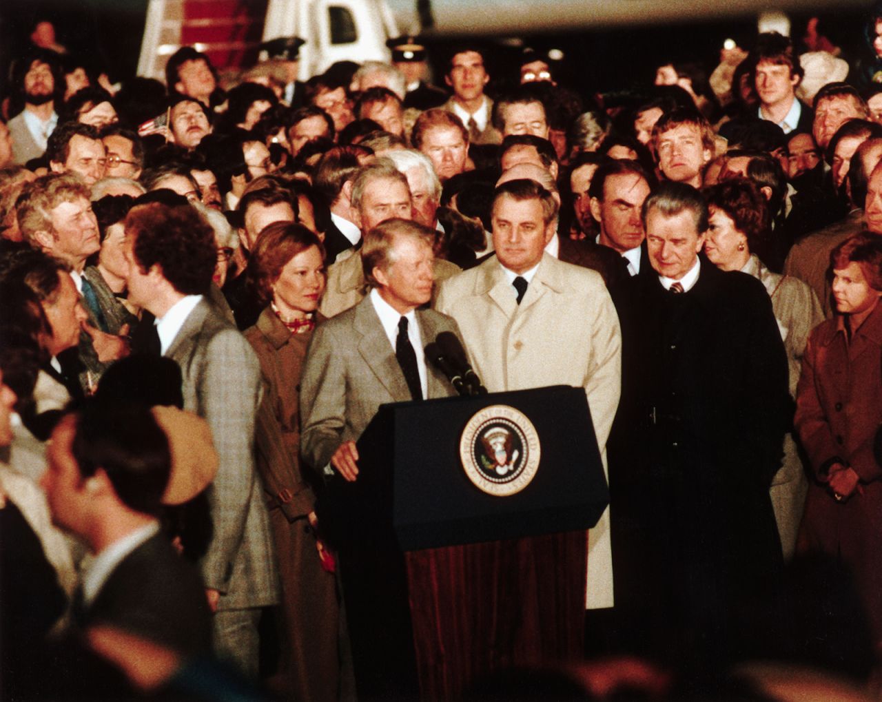 Mondale stands beside President Carter as he gives his concession speech on November 4, 1980, after losing to Ronald Reagan.
