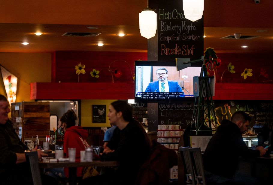 A television inside a Minneapolis restaurant shows the trial on April 1.